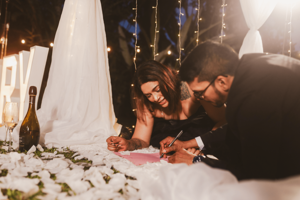 Couple playing game at romantic picnic in Trinidad and Tobago